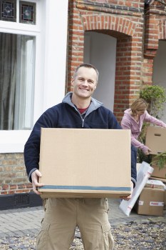 Man and van moving boxes in a Shacklewell street