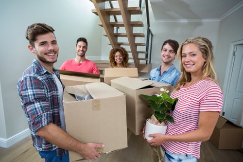 Moving truck service loading furniture in Shacklewell