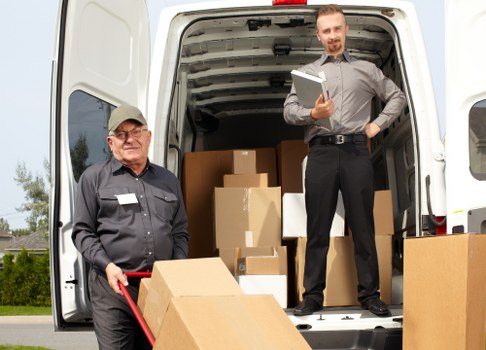 Removal team handling house move logistics in Shacklewell