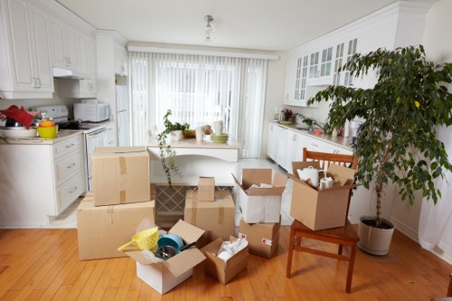 Furniture being carried from a flat during a Shacklewell removal