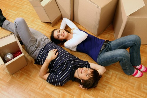 Packed boxes and furniture ready for transport in an East London home move